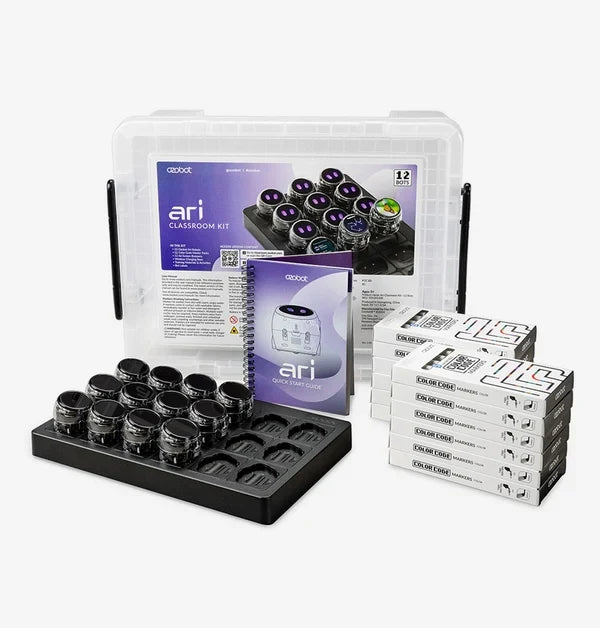 The Ari Classroom Kit for twelve: a clear lidded storage tub, the lesson folder and quick start guide, twelve Ari robots seated in a black charging tray, and a stack of Color Code marker boxes.