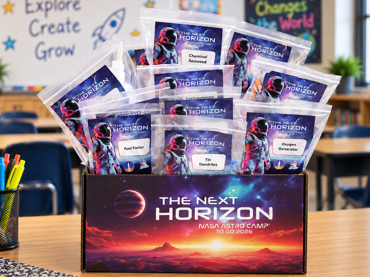 The Next Horizon kit open on a classroom desk, a dozen sealed bags fanned out of it with their activity names printed on the front -- Chemical Seaweed, Fuel Factor, Tin Dendrites, Oxygen Generator -- and not a shopping list in sight.