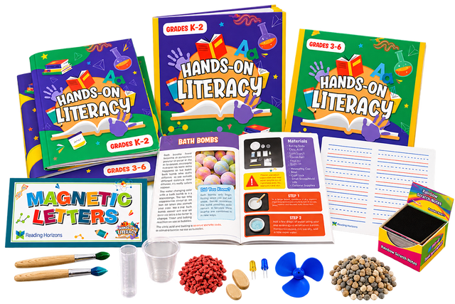 The Hands-On Literacy kit components arranged together: the K-2 and 3-6 guides, an open activity spread, a case of Reading Horizons magnetic letters, the lined writing board, a pad of rainbow scratch notes, paint brushes, mixing cups, a propeller, LEDs and bagged dry materials.