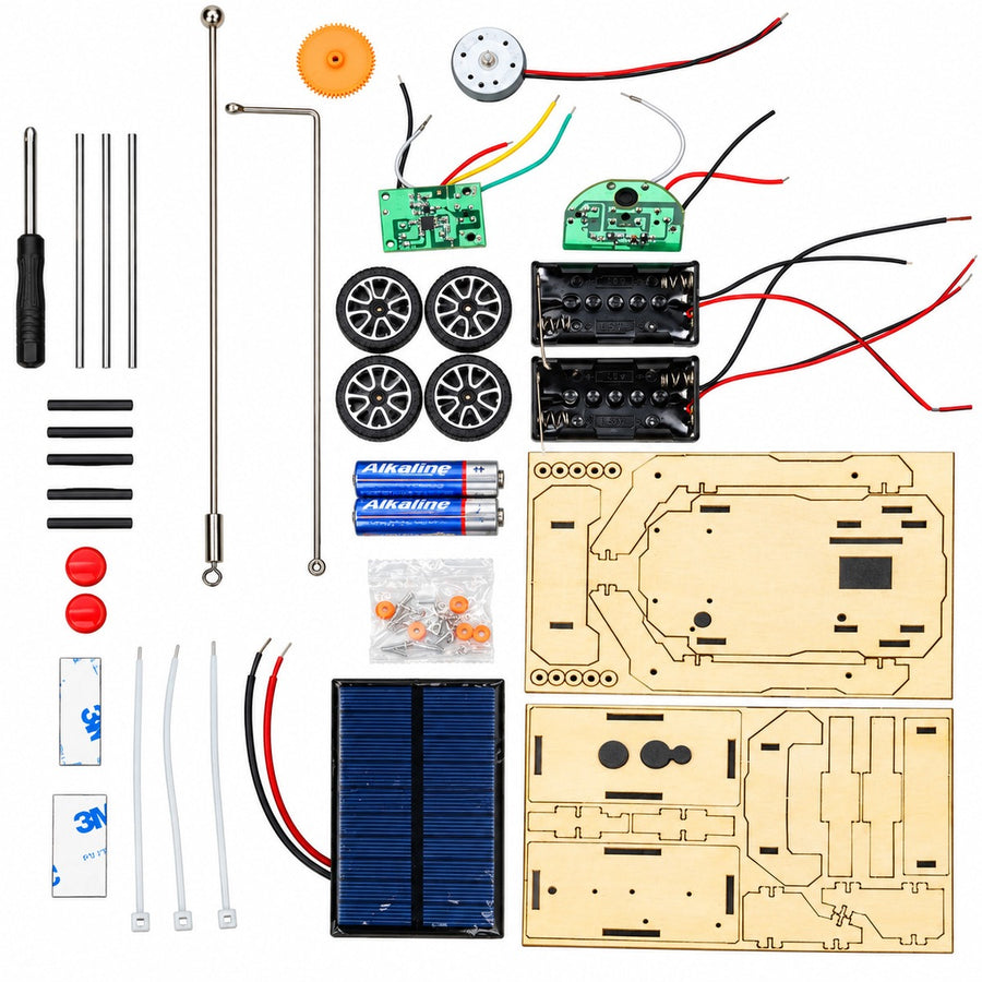 The kit laid out on white: the solar panel, two battery cases, two circuit boards, the motor, wheels, axles and the laser-cut wooden boards