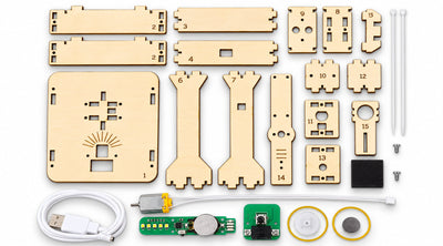 Everything in the kit laid out: fifteen numbered laser-cut wooden boards, the motor, the LED display board, the circuit board with its switch, a coin cell, white gear, magnet, rubber bands, felt pads, screws, cable ties and a USB cable